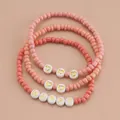 Ensemble de 3 bracelets bohèmes en perles dégradées roses avec breloques Happy - Ensemble 3 pièces HAPPY