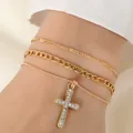 Three-piece gold alloy bracelet set featuring a delicate chain and sparkling cross pendant - 3Pcs Gold Cross Bracelets