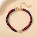 Bracelet bohème à trois rangs de perles rouges, noires, bleues avec pendentif cœur doré - Bracelet triple couche cœur noir rouge