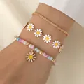 Driedelige gouden madeliefjes armbandset met kleurrijke kralen en emaille bloemenhangers - Kleurrijke Kralenarmband met Zonnebloem (Stijl 3 - Armband)
