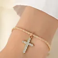Elegant gold braided chain bracelet with a sparkling crystal-encrusted cross pendant - Gold Cross Bracelet