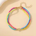 Bracelet à trois rangs de perles colorées avec pendentif cœur doré et fermoir réglable - Bracelet triple couche cœur jaune rose