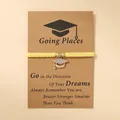 Yellow braided graduation cap bracelet with crystal rhinestones on display card - Doctor Hat / Yellow Bracelet