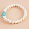 Bohemian armband met witte marmeren kralen en een turquoise schildpad bedeltje - Schildpad Hanger Stijl / Gevlochten armband / Witte Turkoois