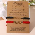 Geflochtene Unendlichkeits Herz Armbänder in Schwarz und Rot auf einer Geschenkkarte - Schwarz Rot