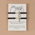 Luminous bead woven bracelets with sun and moon pendants on a graduation gift card - Luminous Sun Moon Black Rope