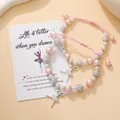 Verstelbare roze parelarmband met glanzende strass ballen en een balletdanseres hanger - Gevlochten Touw Kralen Stijl / Roze (FD253286)