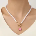 Bohemian pearl bracelet featuring a pink enamel sunflower and golden toggle clasp - Clavicle Necklace Pink Daisy Pearl Style (Necklace Pink)