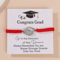 Red braided cord graduation bracelet with stainless steel mortarboard charm and card - Red