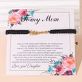 Verstelbare zwarte geweven Mama armband met gouden letters op een bloemenkaart - Zwart - Gouden Label