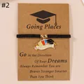 Handmade woven graduate bracelet with enamel mortarboard and book charms on gift card - Flower Pen Book Doctoral Cap / Black