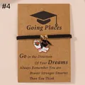 Adjustable black woven graduation bracelet with mortarboard charm and message card - Flower and Cap / Black