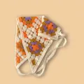 Bandeau au crochet fait main blanc crème avec motif floral orange et violet bohème - Taille unique / Fleur à carreaux - Orange Violet Marron