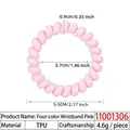 Flexibles rosa Spiralhaargummi aus TPU mit 5,5 cm Außendurchmesser im Telefonkabel-Design - Vierfarbiges Armband Rosa