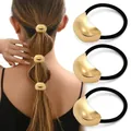 Three-piece black elastic hair ties set featuring minimalist gold metal bean accents - Gold Metal Bean Style Combo