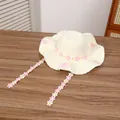 Cream summer straw hat with colorful floral trim and decorative long ribbon ties - Peach Blossom Creamy White