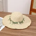 Beige woven straw sun hat with daisy flower wreath and frayed brim detail - Da La Mui Beige