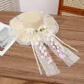 Beige wide brim straw sun hat with white lace trim and purple lily of the valley flowers - Wind Chime Beige