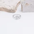 Detailed macro view of S925 sterling silver rose ring with a sparkling center zircon stone - US Size 5 / White Gold