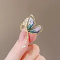 Exquisite golden butterfly brooch featuring purple-green gradient wings and crystal charms - Purple Tassel Butterfly