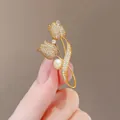 Elegant gold tulip brooch with pavé zircon petals and a round pearl accent - Tulip