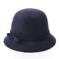 Classic dark blue wool cloche hat for women featuring a side bow and elegant vintage style - Mixed Teal
