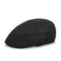Dettaglio della coppola in rete nera che mostra la trama traspirante e il bottone superiore - 58cm / Nero