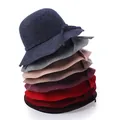 Variety of wool cloche hats with bow details in navy, grey, beige, red, and black - All Colors