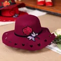 Dark red wool fedora hat featuring rose embroidery and heart-shaped cutouts on the brim - M (56-58cm) / Burgundy