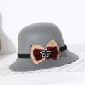 Elegante grijze wollen cloche hoed voor dames met gelaagde strik en strass detail - M (56-58cm) / Grijs