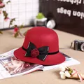 Elegant red wool cloche hat for women featuring a black bow and crystal floral detail - M (56-58cm) / Red