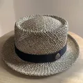 Classic woven boater straw hat in natural beige with a black ribbon and gold crest - M (56-58cm) / Bumpy Top Style / Natural