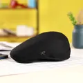 Casquette gavroche noire classique en coton et lin respirant avec détail R en métal - M / Noir
