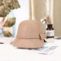 Elegant camel wool cloche hat for women featuring a stylish bow and woven ribbon trim - Mixed Camel