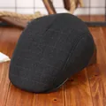 Heren flat cap in donkergrijs geruit met oorbescherming voor winterse warmte - Grafiet