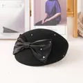 Elegant black wool beret with large silk bow and pearl accents for women - M (56-57cm) / Black