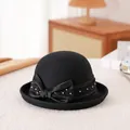 Elegant black wool felt cloche hat with a satin bow and pearl detail for women - 56-57cm / Black