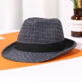 Classic grey checkered fedora hat featuring a stylish black ribbon band on a flat lay surface - M (56-58cm) / Grid Fedora Navy