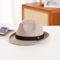 Classic beige felt fedora with black ribbon band and metal badge detail in vintage style - Milk Tea Color (9#)
