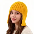 Detail of bright yellow knit ear protection hat with thick vertical ribbed texture - Yellow