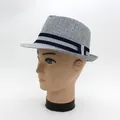 Blue and white textured fedora straw hat with a stylish two-tone ribbon and decorative knot - Navy Blue