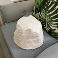 Minimalist white pleated bucket hat for women with textured fabric for outdoor sun protection - M / White