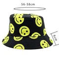 Unisex black bucket hat with yellow smiley face print for sun protection outdoor wear - M / Black With Yellow Smile Face