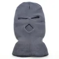 Detailed texture of charcoal grey 3-hole knitted balaclava with durable winter material - Gray