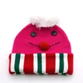 Detail of knitted Christmas hat with pom-poms and cute festive smiling face embroidery - Kids / Rose Red Snowman