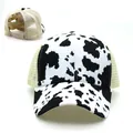 Women's cow print ponytail baseball cap with breathable mesh and criss-cross back elastic - Cow White