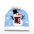 Detailed close-up of a blue knitted Christmas hat featuring a cartoon snowman and white pom-pom - Kids / Big Snowman Style
