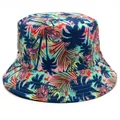 Detail of tropical bucket hat featuring flamingo and palm leaf prints on teal cotton fabric - One Size / Blue Flamingo Palm Leaf (Style 3)