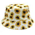 Detail of sunflower print on a reversible white cotton bucket hat for outdoor sun protection - M(56-58cm) / White