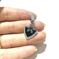 Macro shot of shield-shaped pendant with snowflake motif and micro-pave cubic zirconia - Silver Black Shield Snowflake (1)